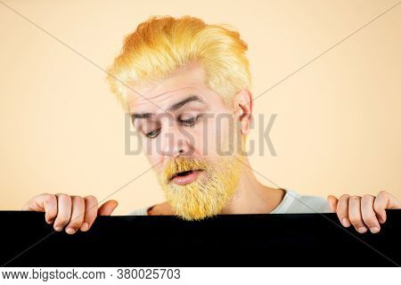 Close Up Portrait Of Man Showing Plain Blank Sign