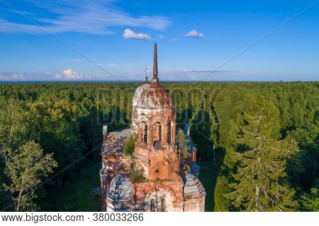 Bell Tower Of The Abandoned Old Trinity Church (life-giving Trinity In Yazvishchi) Close-up On A Sun