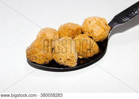 A Picture Of Soya Chunks On White Background