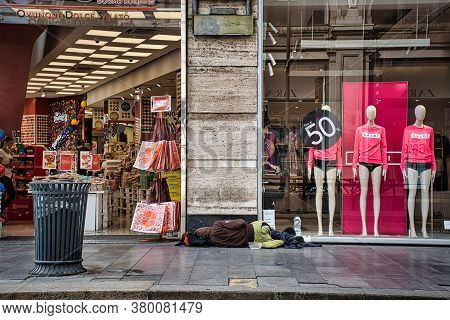Homeless People On The Streets Of Milan