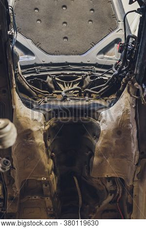 Detail Of A Car Engine Room Without An Engine Compartment.