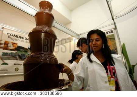 Ilheus, Bahia / Brazil - July 7, 2011: Melted Chocolate Machine Is Seen At A Cocoa Exhibition Fair I