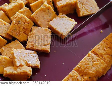 Cakes Of Dal Being Cut In Uniform Pieces To Cook Dhoka R Dalna A Popular Bengali Vegeterian Recipe