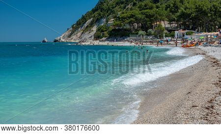 The Bay Of Portonovo With The Conero Mount In The Background In A Beautiful Summer Day
