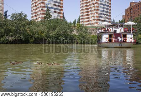 Valladolid, Spain - July 19th, 2020: Pisuerga River Tourist Boat. Valladolid, Spain