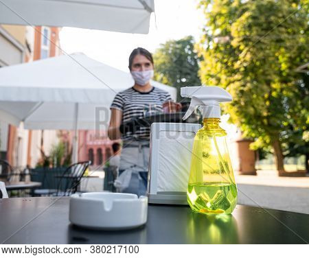 Uzhhorod, Ukraine -  August 7,2020: : Summer Street Terrace In Uzhhorod, Ukraine. Waiter In Protecti