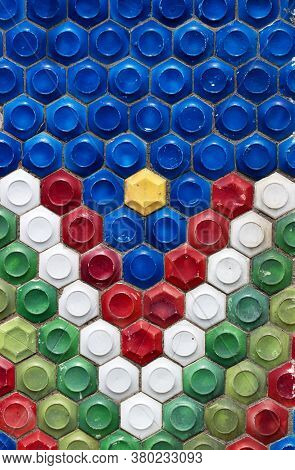 Mosaic Of The Soviet Period In The Form Of Honeycombs On A Concrete Wall.