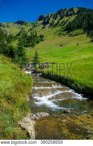 Little River In Mountains Valley. Road To First Sumit (grindelwald) (jungfrau Region, Bern, Switzerl