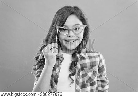 Child In Good And Positive Mood. Looking Strict In Glasses. Small Girl Prefect Casual Fashion. Happy