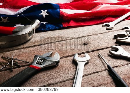 Usa Labor Day Concept, Top View Flat Lay Of Different Kinds Wrenches With American Flag On Wood Tabl