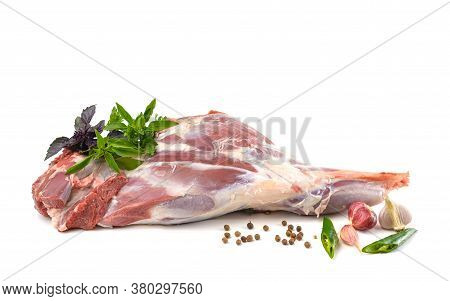 Raw Leg Of Mutton On A Bone On A White Isolated Background. Sheep Meat Close-up.a Fresh Piece Of Mut