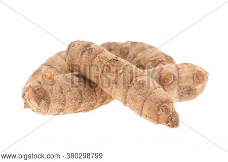 Turmeric Powder And Turmeric Isolated On White Background.