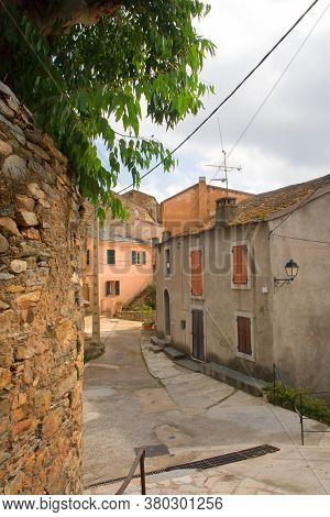 Looking through Little lane French village Casinca