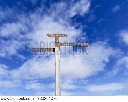Directional Sign Pole Indicating Directions To Laugavegur, Alftavatn And Hrafntinnusker. Hiking In I