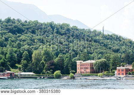Shoreline of Lenno ?ommune on Como Lake. Lombardy. Italy. Panorama with Mountains and Forest.