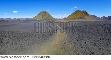 Black Volcanic Landscape In Katla Nature Reserve On Laugavegur Hiking Trail In Iceland. Panorama.