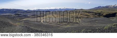 Black Volcanic Landscape In Katla Nature Reserve On Laugavegur Hiking Trail In Iceland. Panorama.