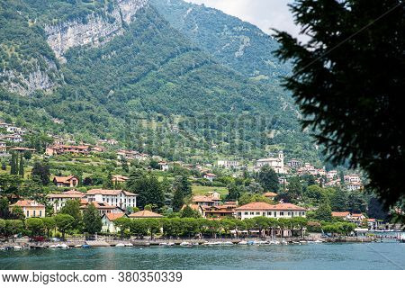 Lenno ?ommune on Como Lake. Lombardy. Italy. Picturesque Italian Landscape with Old Town. Stunning Panorama with Mountains and Forest.