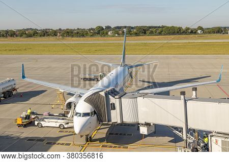 Lviv, Ukraine - 09 Aug 2020: Mau International  Plane Unloads Baggage At The Lviv Lwo Danylo Halytsk