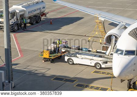 Lviv, Ukraine - 09 Aug 2020: Mau International  Plane Unloads Baggage At The Lviv Lwo Danylo Halytsk