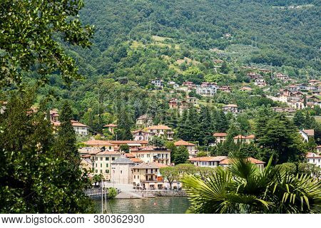 Lenno ?ommune on Como Lake. Lombardy. Italy. Picturesque Italian Landscape with Old Town. Stunning Panorama with Mountains and Forest.