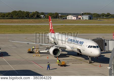 Lviv, Ukraine - 09 Aug 2020: Turkish Airlines Passenger Plane Unloads Baggage At The Lviv Lwo Danylo