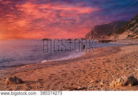 Fantastic Colorful Spring Sunset View Of Avali Beach. Picturesque Evening Seascape Of Ionian Sea. Le