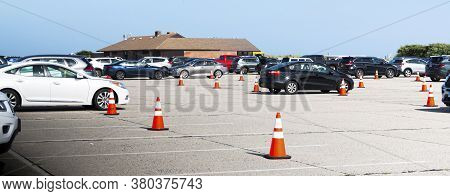 Babylon, New York, Usa - 3 August 2020: State Park Beaches Parking Lot With Orange Construction Cone