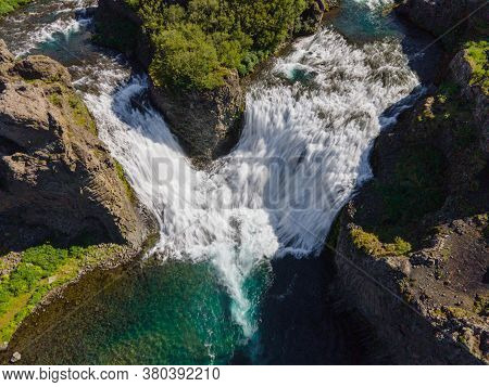 Hjalparfoss Waterfall In The Highlands Of Iceland
