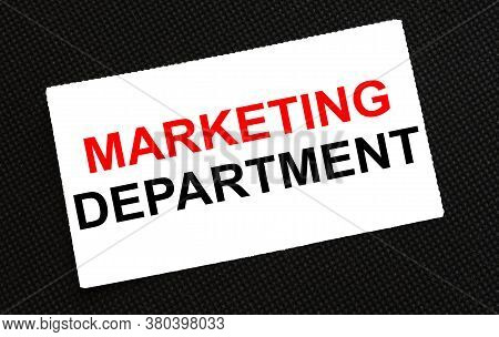 White Card On The Black Background With Text Marketing Department