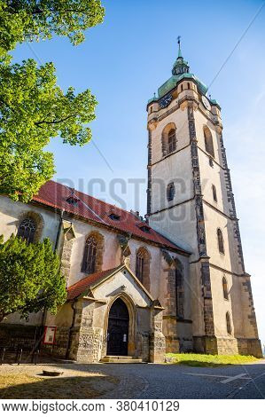 Steple Of Gothic Church Of St. Peter And Paul In Town Melnik In Czech Republic