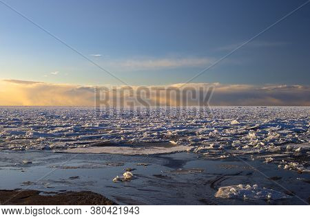 Spring Sunset Over The Melting Ice Of The Gulf Of Bothnia