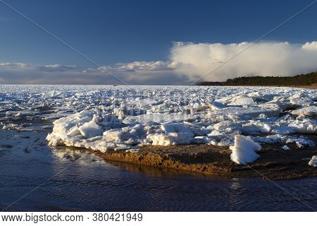 Spring Sunset Over The Melting Ice Of The Gulf Of Bothnia