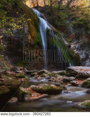 Beautiful Autumn Forest. Autumn Forest Landscape. Jur-jur (dzhur-dzhur) Waterfall In The Mountains O