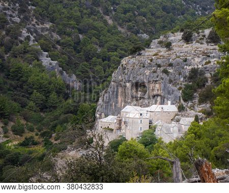 Monastery In The Side Of The Mountain, Pustinja Blaca, Deserted Remote Area On The Island Of Brac In