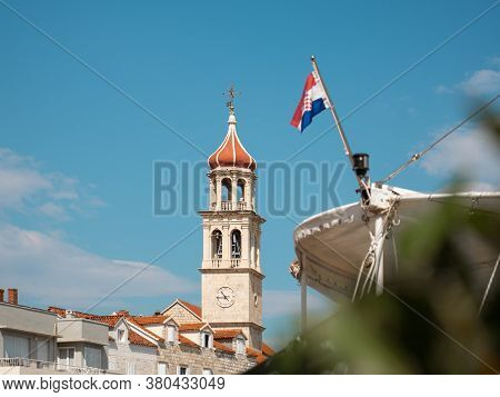 View Of The Christian Church Belltower In The Small Town Of Sutivan On The Island Of Brac. Croatian 
