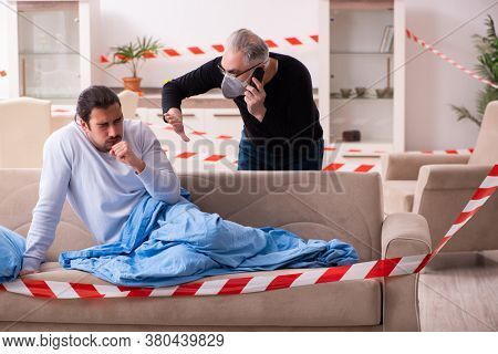 Father and son in coronavirus disease concept at home