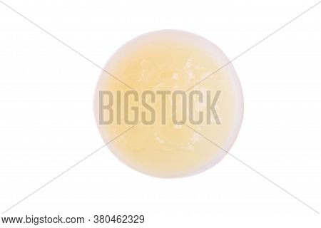 Vaseline Oil In A Plastic Jar Isolated On White Background. Top View