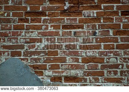 Textured Brick Wall. An Ancient Red Brick Wall. Beautiful Natural Background
