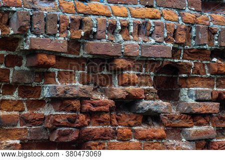 Textured Brick Wall. An Ancient Red Brick Wall. Beautiful Natural Background