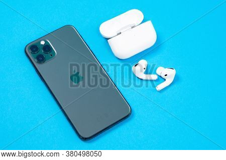 Rostov, Russia - July 06, 2020: Smartphone Apple Iphone 11 Pro Of Midnight Green Color And Wireless 