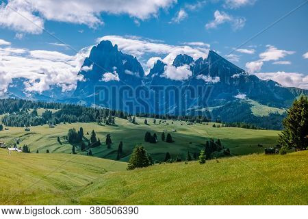 Alpe Di Siusi - Seiser Alm With Sassolungo - Langkofel Mountain Group In Background At Sunset. Yello