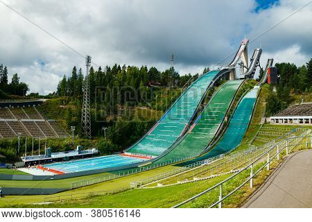 Lahti, Finland - 4 August 2020: Lahti Sports Centre With Three Ski Jump Towers And Outdoor Swimming 