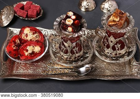 Turkish Armuds With Tea And Sweets On Metal Tray On Dark Background, Closeup, Horizontal Format