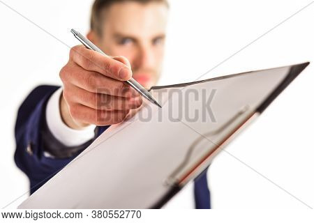 Signing Documents Concept. Man With Serious Face Writes On Planchette