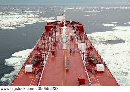 The Feed Of A Ship Sailing In The Arctic. Landscape Of The Arctic From The Deck Of The Tanker.
