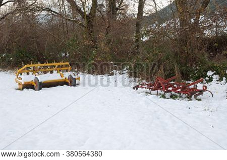 Farming tools in a snowy field. Sabinanigo Alto. Huesca. Aragon. Spain.