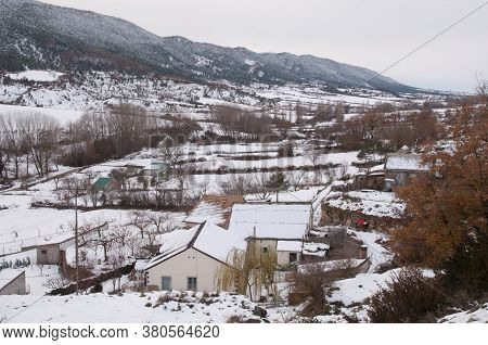 Houses and rural landscape covered with snow. Sabinanigo Alto. Huesca. Aragon. Spain.