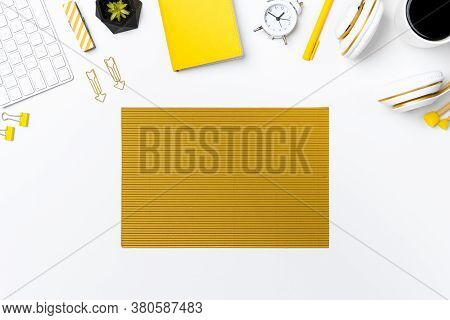 Flay Lay Of Office Desk With Crepe Paper On White Background. Top View Stationary Arrangement On Des