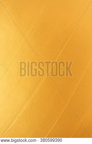 Shiny Golden Metallic Gritter Bright Backgound Texture. Elegant And Luxury Gold Color Abstract Verti